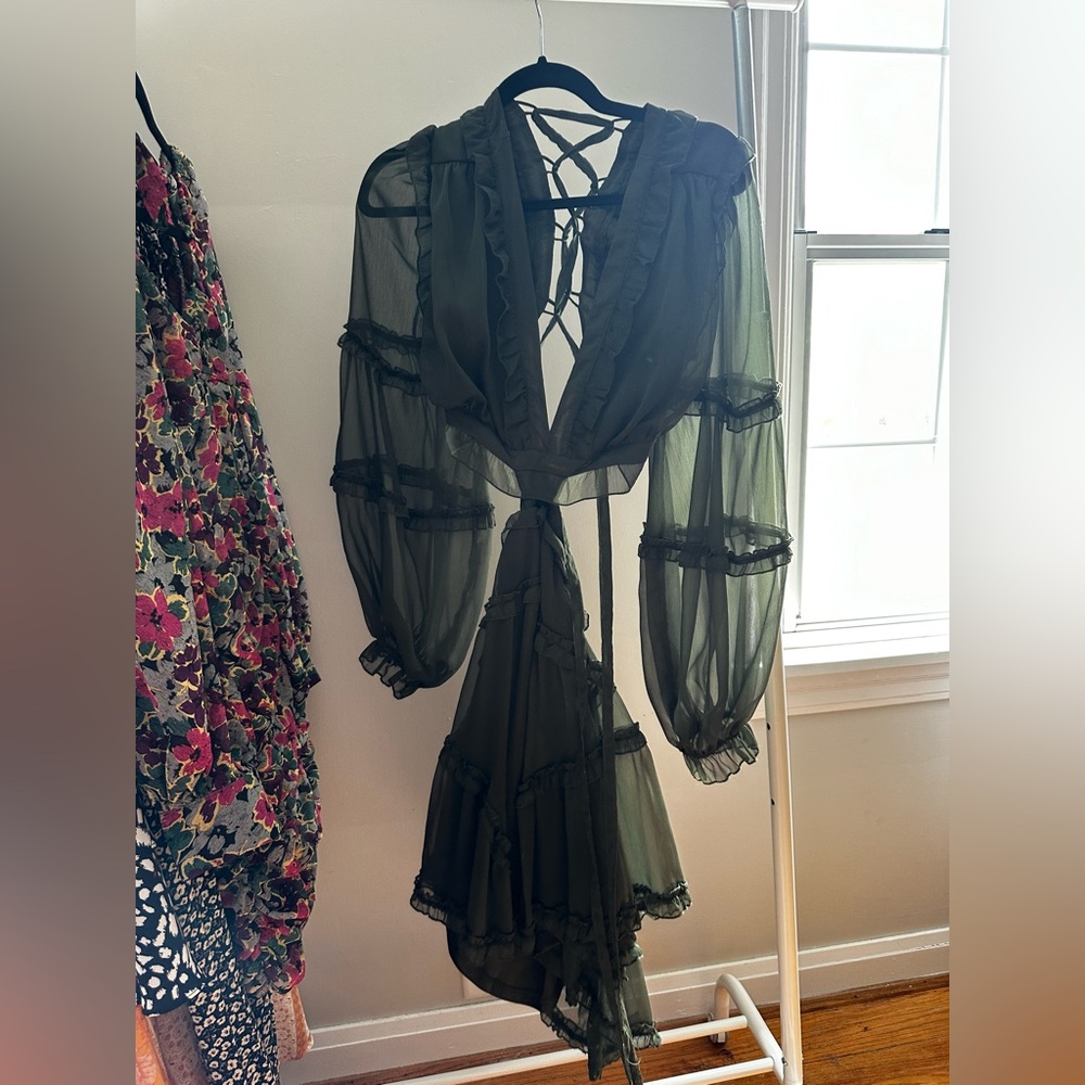 Green dress with cut outs & a cross cross tie back!